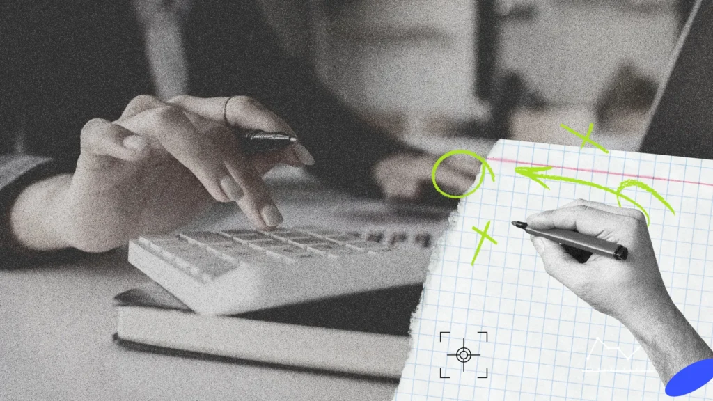 Person using calculator for small business bookkeeping